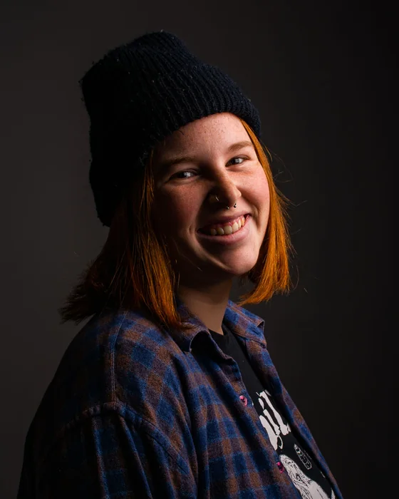 Studio portrait with warm side lighting